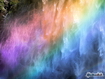 Rainbow Over A Waterfall